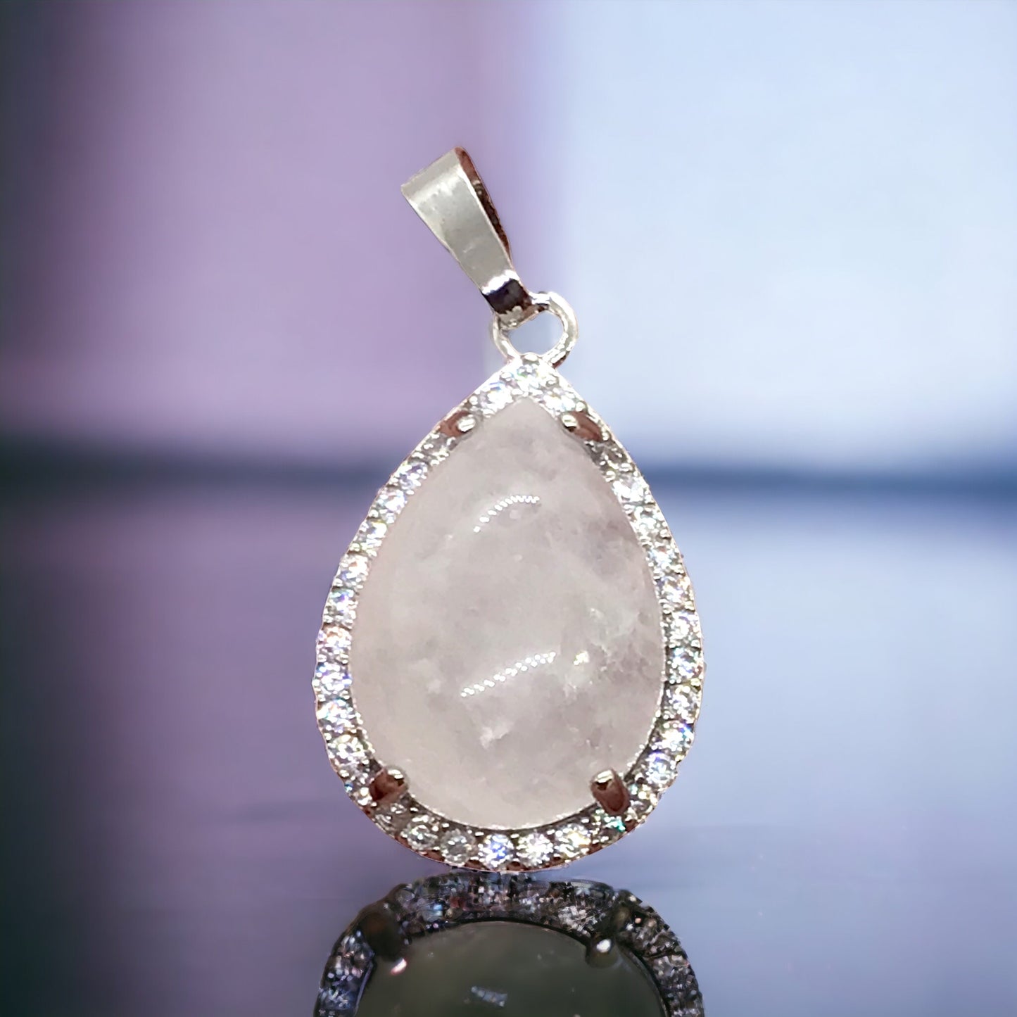 Steinfixx® - Royale Edelstein Anhänger in Tropfenform, umrahmt von Zirkonia, Edelstahl versilbert