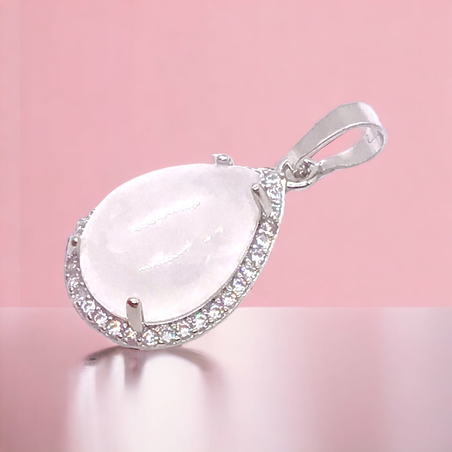 Steinfixx® - Royale Edelstein Anhänger in Tropfenform, umrahmt von Zirkonia, Edelstahl versilbert